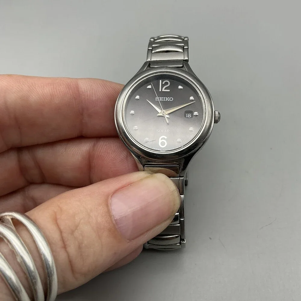 Seiko Solar Womens Watch 28mm Black Dial Silver Tone Stainless Stretch Bracelet